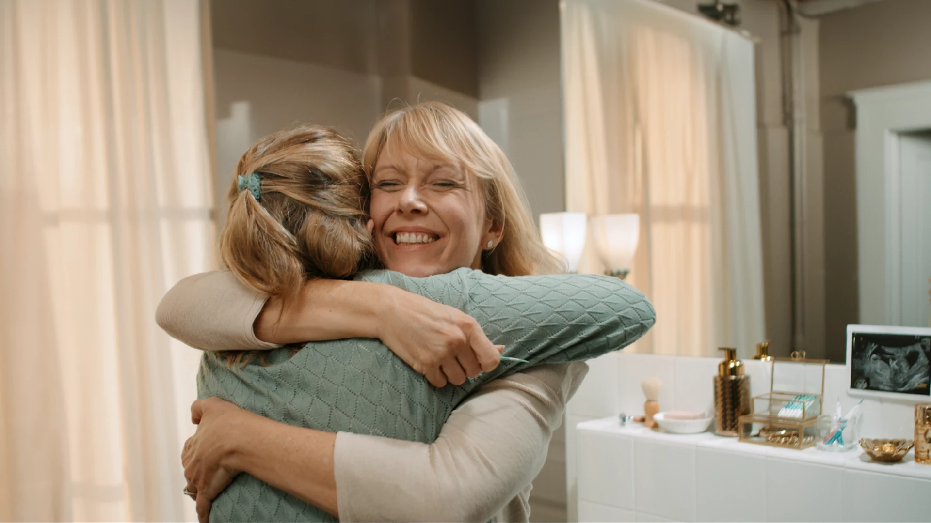 Two women hugging